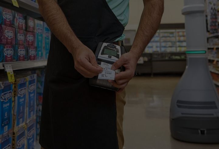 Retail shop worker using Zebra mobile printer
